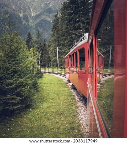 Train for turism in the mountains Royalty-Free Stock Photo #2038117949