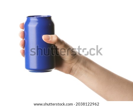 Hand with can of soda on white background