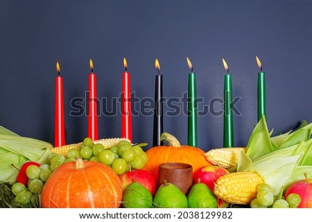 Kwanzaa Afro-American holiday. Corn, bowl and harvest. 