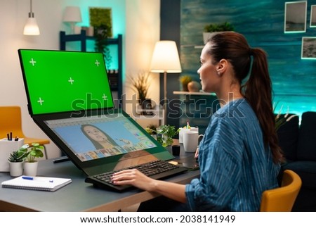 Office studio employee working with green screen and retoucher for professional gradient pictures. Photography specialist using mockup template and chroma key for isolated background
