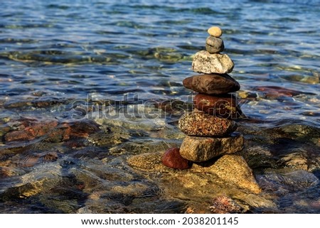 Stones laid out in the form of a pyramid on the seashore