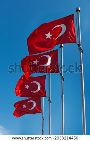 Turkish flags at pole sky background