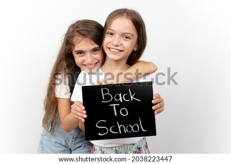 Back To School Concept, Happy Smiling Schoolgirls. education concept, banner, poster.

