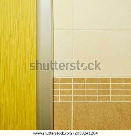 Beige ceramic tile and bordure, can be used indoors and outdoors, on a wall as a background
