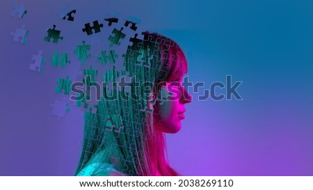 Conceptual image with portrait of young woman made of pieces of puzzle. Emotional chaos in a person's head. Concept of mental health, social issues, diversity, psychology of personality. Royalty-Free Stock Photo #2038269110