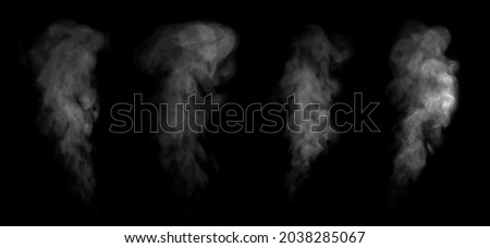 Set. Close-up of steam or abstract white smog rising above. water droplets that can be seen that swirl beautifully from humidifier spray. Isolated on a black background Royalty-Free Stock Photo #2038285067