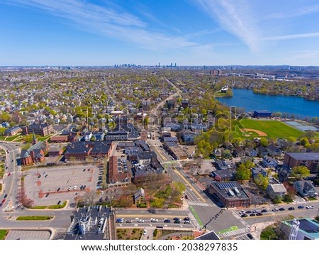 Arlington historic town center aerial view on Massachusetts Avenue at Mystic Street and Broadway with Boston at the background, Arlington, Massachusetts MA, USA.  Royalty-Free Stock Photo #2038297835