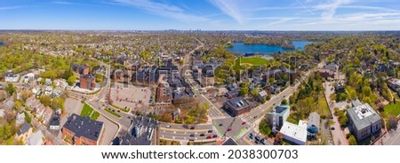 Arlington historic town center aerial view panorama on Massachusetts Avenue at Mystic Street and Broadway with Boston and Spy Pond at the background, Arlington, Massachusetts MA, USA. 