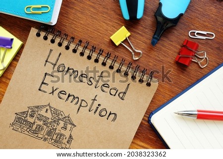 Homestead Exemption is shown on a business photo using the text Royalty-Free Stock Photo #2038323362