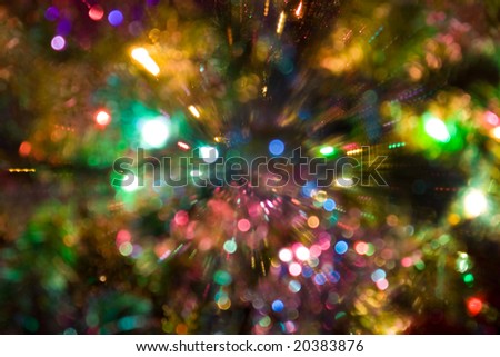 Defocused image of shone bulbs on a christmas-tree