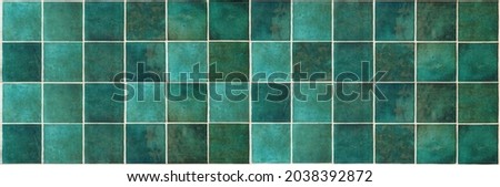 Green ceramic tile background. Old vintage ceramic tiles in green to decorate the kitchen or bathroom 