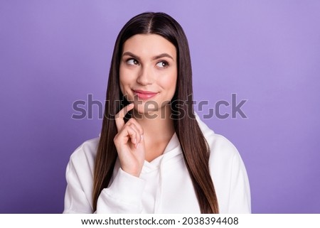 Photo of young positive happy woman look empty space good mood enjoy isolated on purple color background
