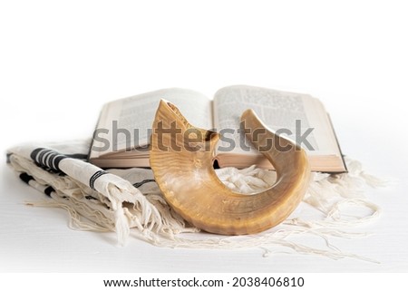 Нom Kippur. Tallit, shofar, torah on a white background. Isolated Royalty-Free Stock Photo #2038406810