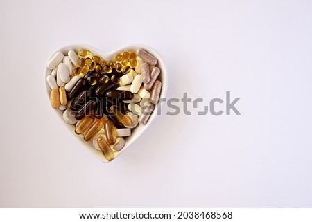 multivitamin dietary supplements on a white background.  immune prevention care concept. dietary supplements isolated Royalty-Free Stock Photo #2038468568