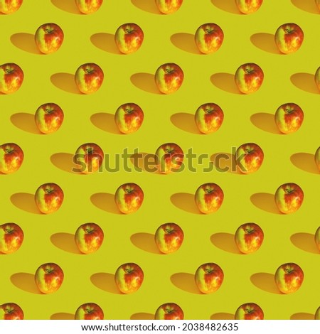 Seamless pattern made from red apple on yellow background, Flat lay photo collage. Food, fresh and ripe fruits. Vegetable background, apple banner. Seamless minimalistic isometric pattern