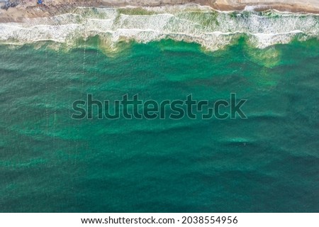 Aerial photography of swimming on the beach,