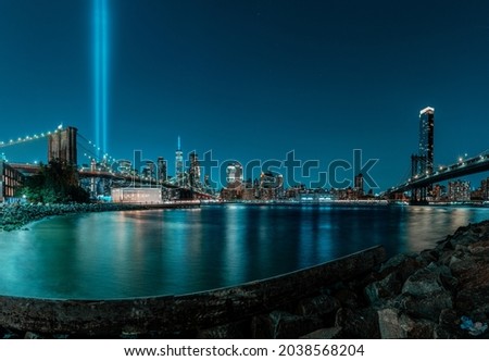"Tribute in Lights" an annual commemoration for the lives lost on Sep 11 Terror Attack in World Trade Center. It lights up from Dusk to Dawn on Sep 11 every year.