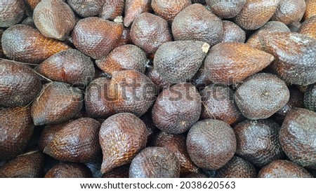 Buah salak or thorny palm or snake fruit of indonesia Salak (Salacca zalacca) is a species of palm tree (family Arecaceae) native to Java and Sumatra in Indonesia
