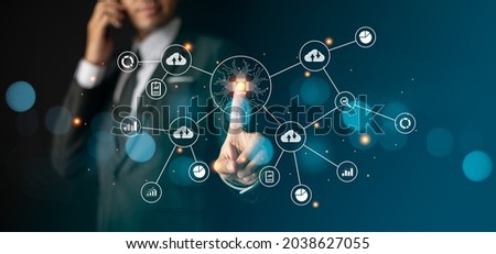 Smart businessman in suit communicates around the world  Royalty-Free Stock Photo #2038627055