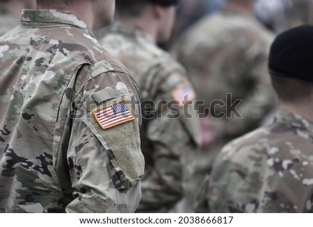 US soldiers. US army. USA patch flag on the US military uniform. Soldiers on the parade ground. Veterans Day. Memorial Day. Royalty-Free Stock Photo #2038666817