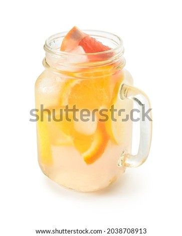 Mason jar of tasty cold lemonade on white background