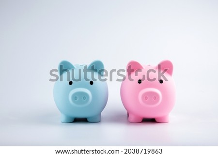 concept of saving money, investing, and interest in the future. Piggy bank and coins isolated on the background. Represents planning and management finances for growth of account funds.