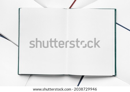 Many blank books, top view