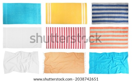 Set with different beach towels on white background, top view Royalty-Free Stock Photo #2038742651