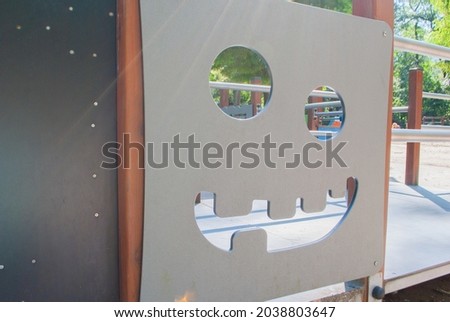 The face in the playground. Muzzle