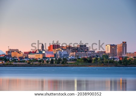 Portland, Maine, USA downtown skyline from Back Cove at twilight.