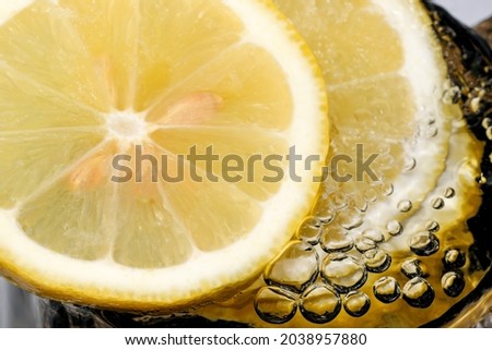 Abstract sweet cold lemonade with gas bubbles close-up macro photography