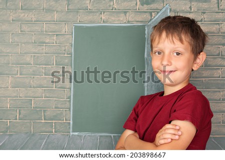 Education idea, the schoolboy before the open door represented on a chalkboard
