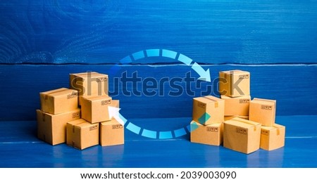 Arrows between boxes. Trade balance and exchange concept. Economic activity. Trading traffic. Transportation and transfer. Buying, selling or bartering goods. Production, manufacture. Deal transaction Royalty-Free Stock Photo #2039003090