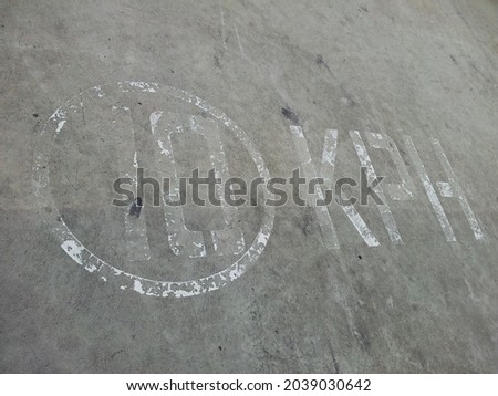 Faded line marking on roads and in car parks