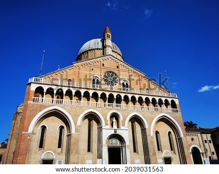 Exterior of Saint Anthony Basilica under clear blue sunny sky in Padua - Italy