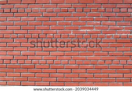 A frontal image of the red brick masonry.