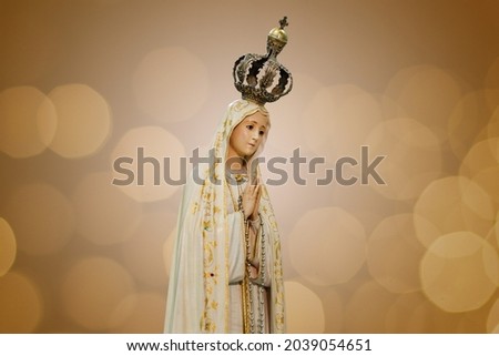 Statue of the image of Our Lady of Fatima, mother of God in the Catholic religion, Our Lady of the Rosary of Fatima, Virgin Mary Royalty-Free Stock Photo #2039054651