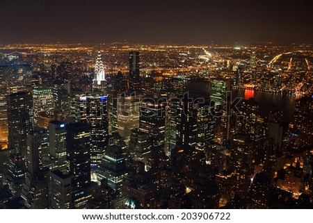 New York City Manhattan  panorama aerial view at night with office building skyscrapers skyline