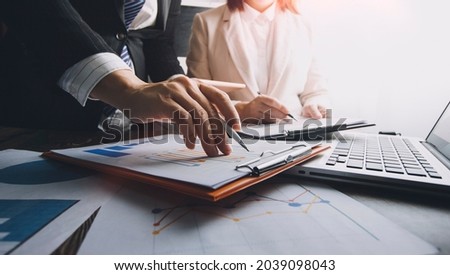 Businessman using tablet analyzing sales data and economic growth graph chart. Business strategy. Abstract icon. Digital marketing.