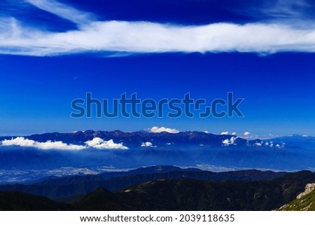 superb view of central alps from the summit of Mt.Shiomi in the Southern Alps,ina city,nagano prefecture,japan. Royalty-Free Stock Photo #2039118635