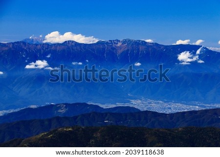 superb view of central alps from the summit of Mt.Shiomi in the Southern Alps,ina city,nagano prefecture,japan. Royalty-Free Stock Photo #2039118638