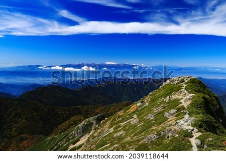 superb view of central alps from the summit of Mt.Shiomi in the Southern Alps,ina city,nagano prefecture,japan. Royalty-Free Stock Photo #2039118644