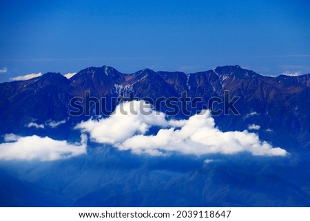 superb view of central alps from the summit of Mt.Shiomi in the Southern Alps,ina city,nagano prefecture,japan. Royalty-Free Stock Photo #2039118647