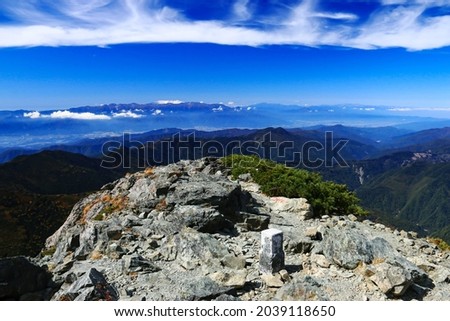 superb view of central alps from the summit of Mt.Shiomi in the Southern Alps,ina city,nagano prefecture,japan. Royalty-Free Stock Photo #2039118650