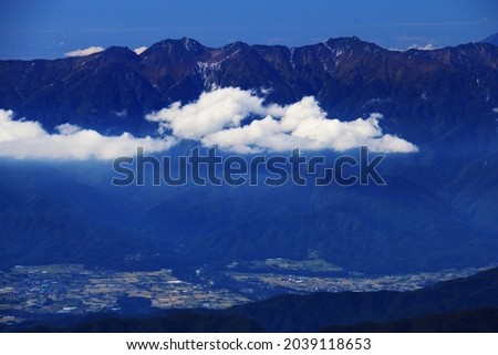 superb view of central alps from the summit of Mt.Shiomi in the Southern Alps,ina city,nagano prefecture,japan. Royalty-Free Stock Photo #2039118653