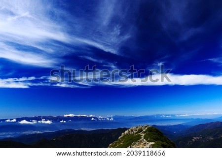 superb view of central alps from the summit of Mt.Shiomi in the Southern Alps,ina city,nagano prefecture,japan. Royalty-Free Stock Photo #2039118656