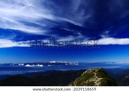 superb view of central alps from the summit of Mt.Shiomi in the Southern Alps,ina city,nagano prefecture,japan. Royalty-Free Stock Photo #2039118659