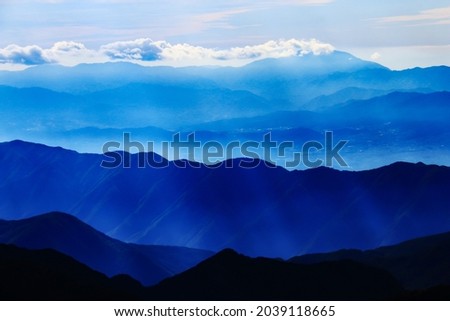 superb view of central alps from the summit of Mt.Shiomi in the Southern Alps,ina city,nagano prefecture,japan. Royalty-Free Stock Photo #2039118665