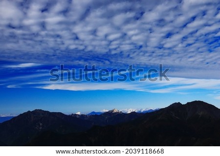 superb view of central alps from the summit of Mt.Shiomi in the Southern Alps,ina city,nagano prefecture,japan. Royalty-Free Stock Photo #2039118668