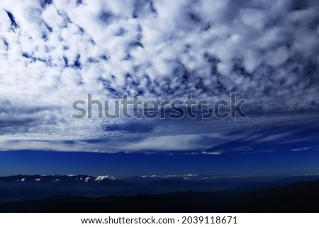 superb view of central alps from the summit of Mt.Shiomi in the Southern Alps,ina city,nagano prefecture,japan. Royalty-Free Stock Photo #2039118671